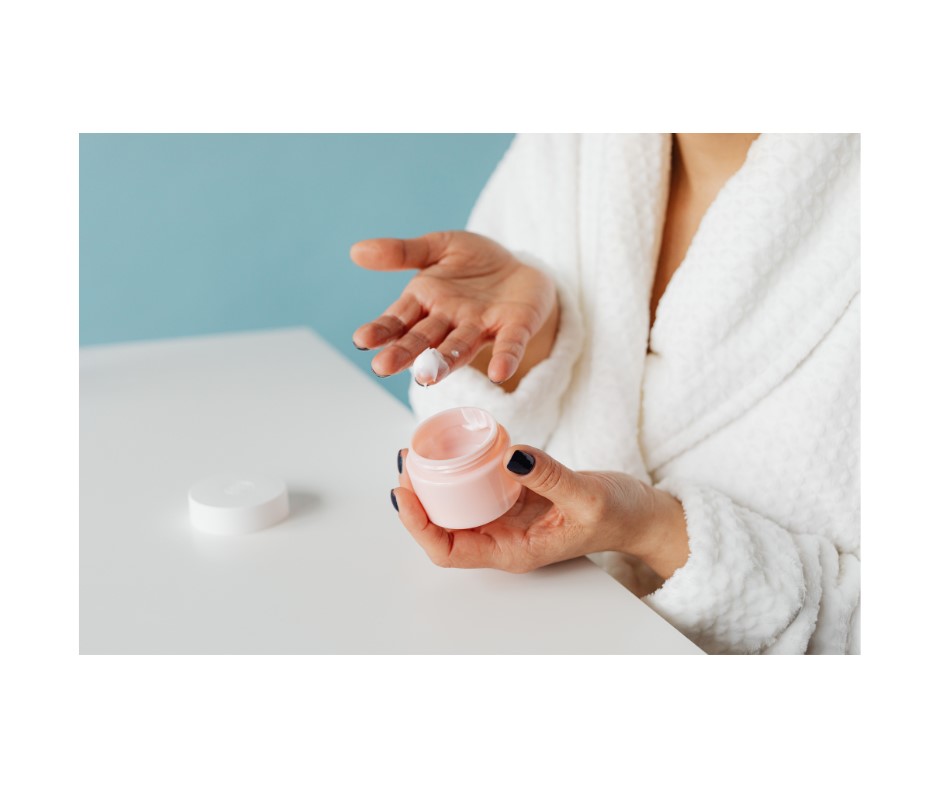 Applying treatment serum for hyperpigmentation at night on melanin skin